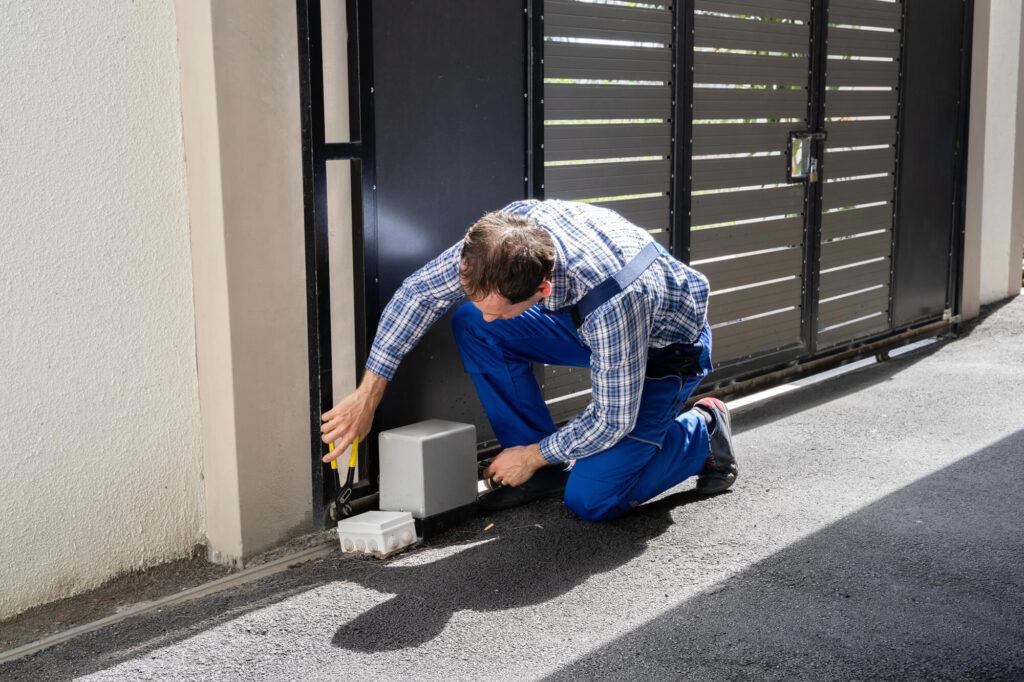 installer testing the new electric gate systems