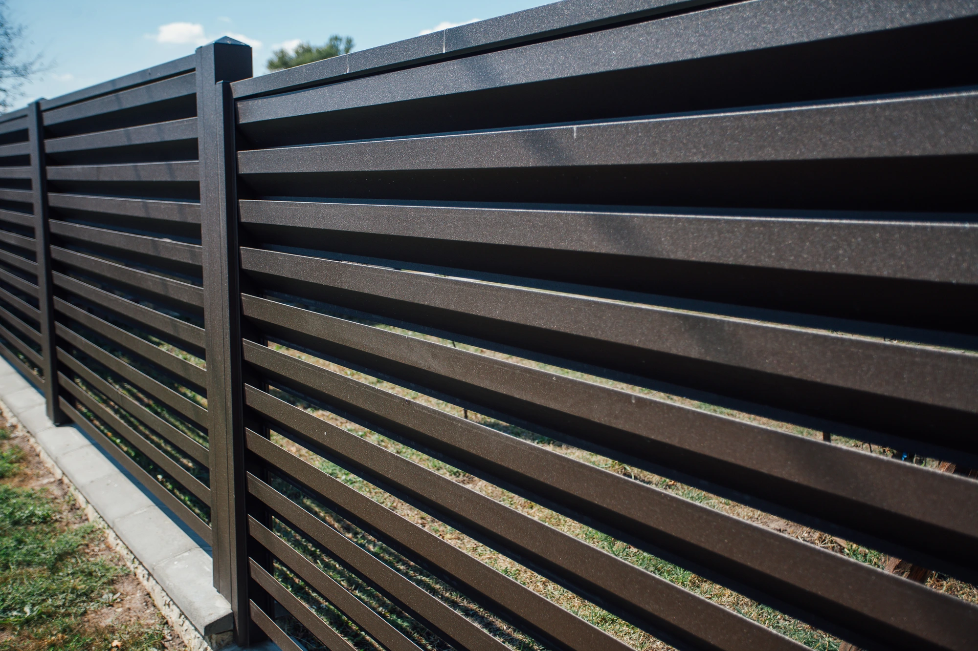 black-wooden-fence-used-in-horse-fencing
