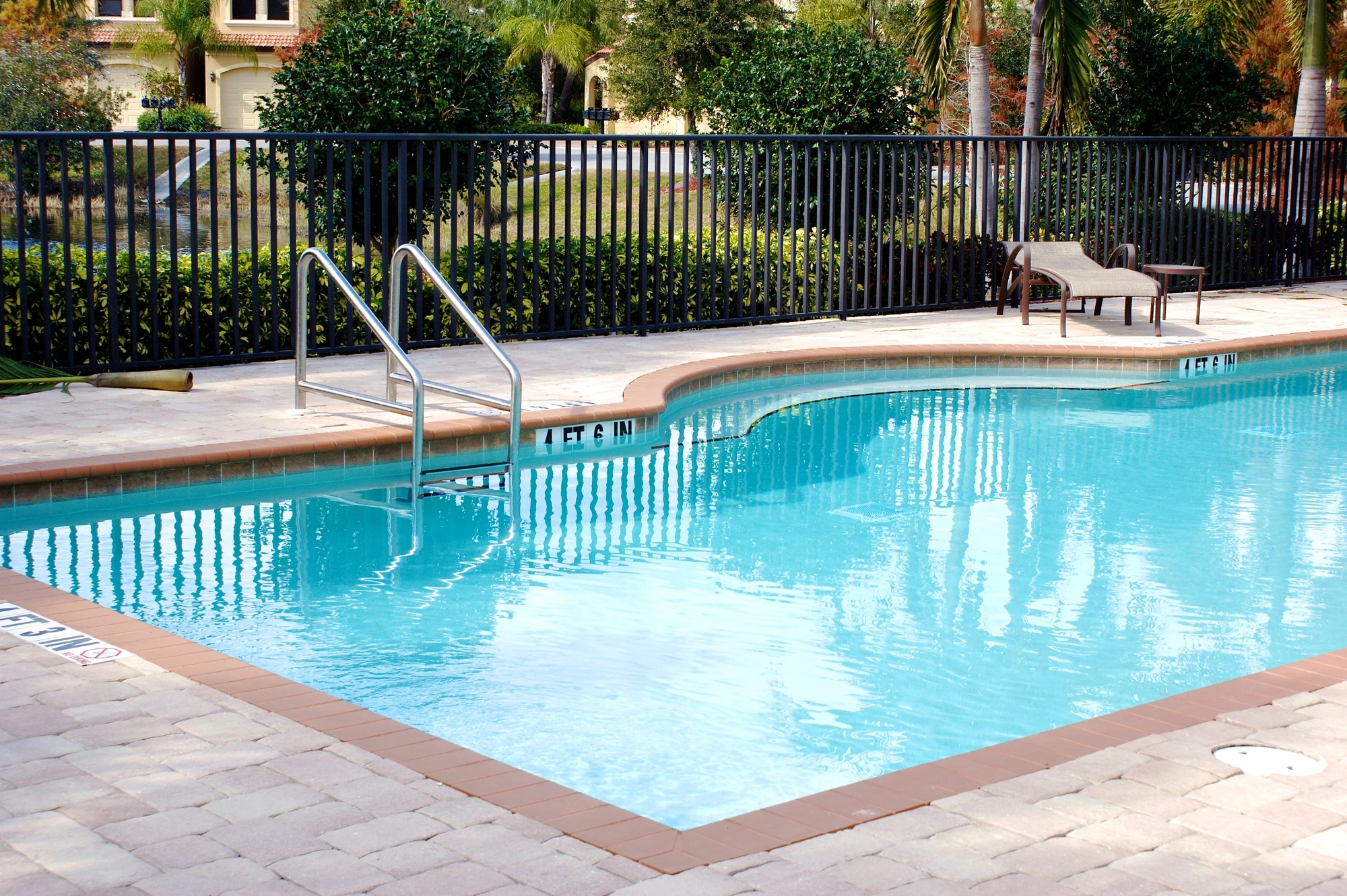 budget-fence-and-gate-next-to-pool